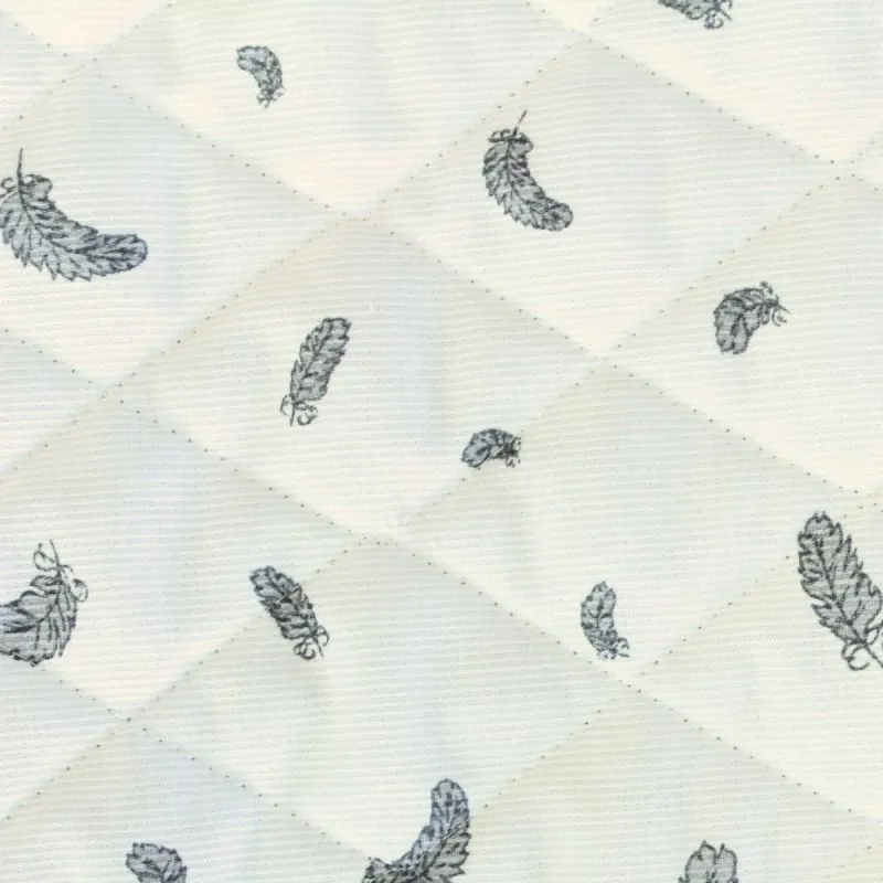 Quilted fabric with feather print